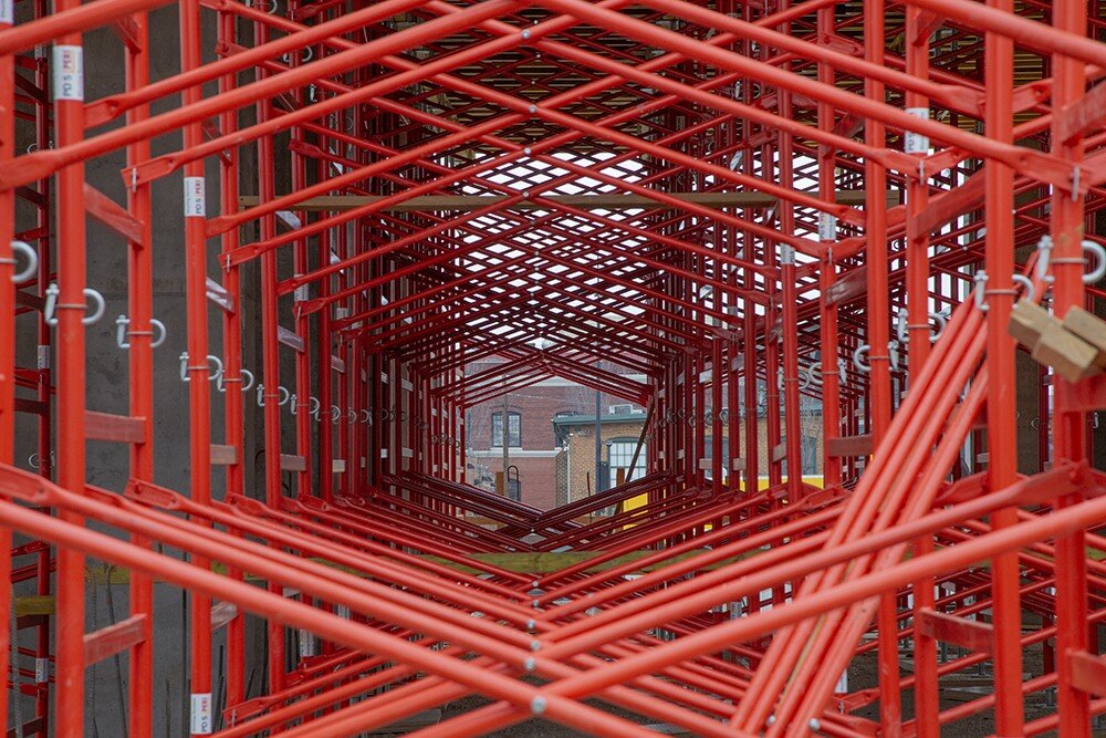 Creative shot of construction site using scaffolding.
