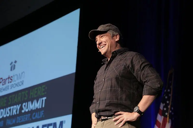 MIke Rowe on stage.