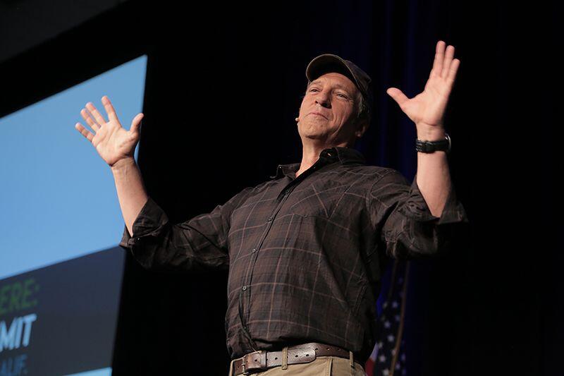 MIke Rowe telling a story.